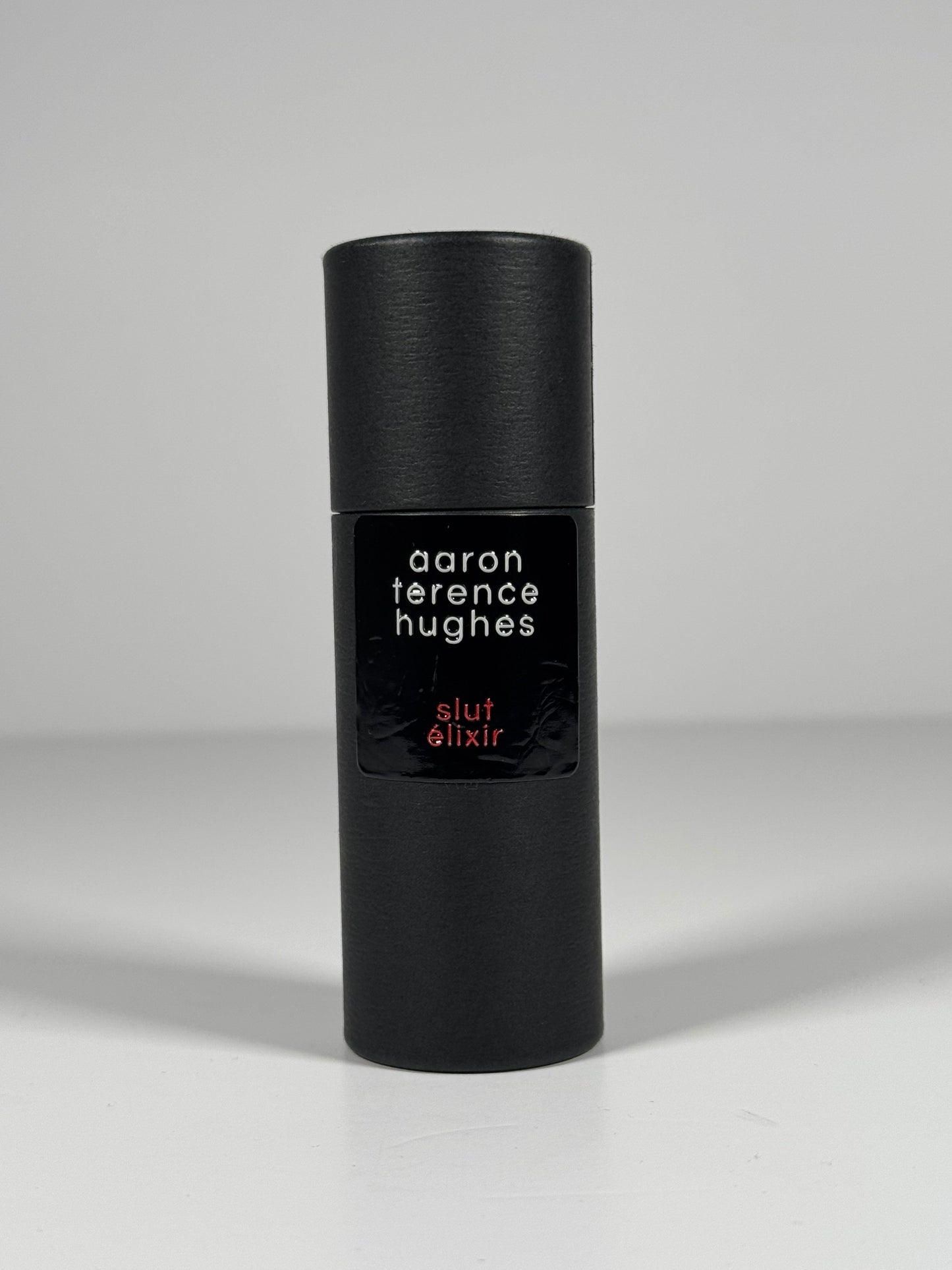 Slut Élixir Aaron Terence Hughes