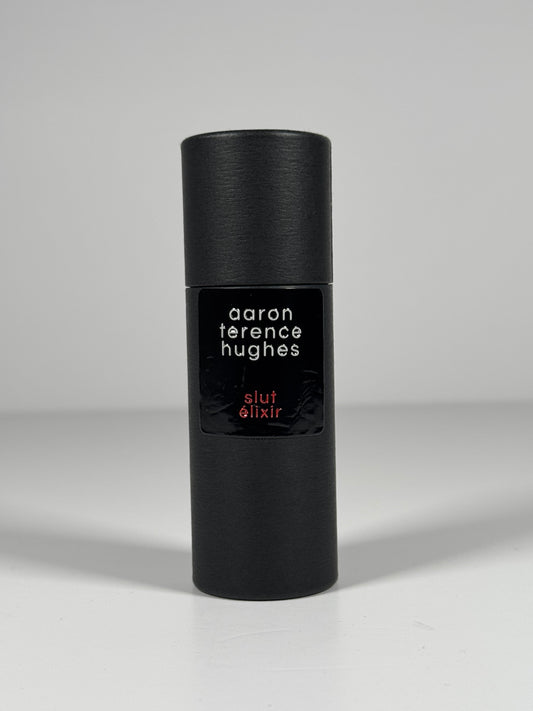Slut Élixir Aaron Terence Hughes